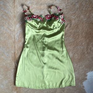 Silk green dress with floral detail